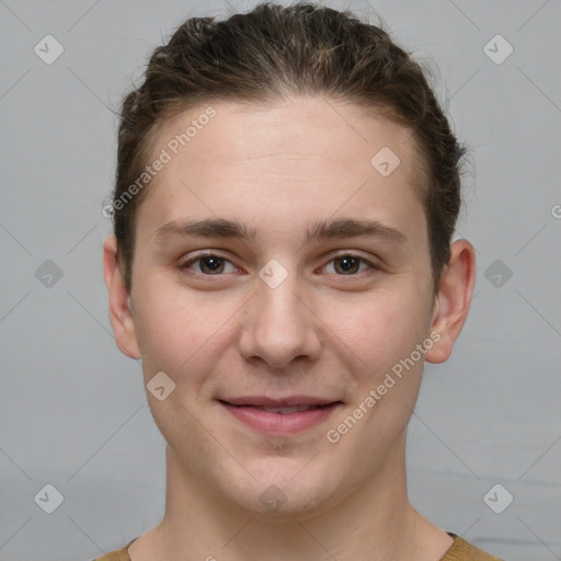 Joyful white young-adult female with short  brown hair and grey eyes