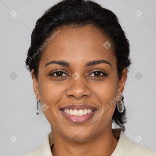 Joyful black young-adult female with short  black hair and brown eyes