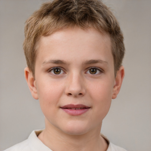 Joyful white child male with short  brown hair and brown eyes