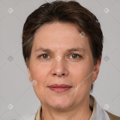 Joyful white adult female with short  brown hair and grey eyes