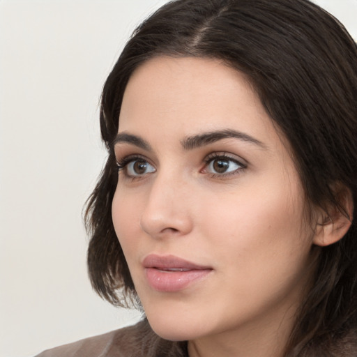 Neutral white young-adult female with medium  brown hair and brown eyes