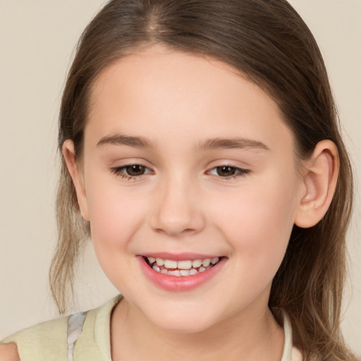 Joyful white child female with medium  brown hair and brown eyes