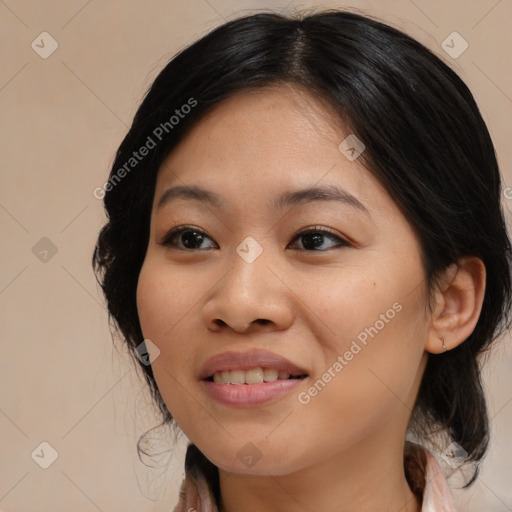 Joyful asian young-adult female with medium  brown hair and brown eyes