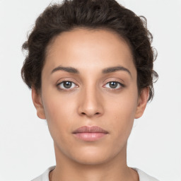 Neutral white young-adult female with short  brown hair and brown eyes