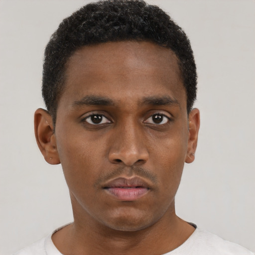 Neutral black young-adult male with short  brown hair and brown eyes