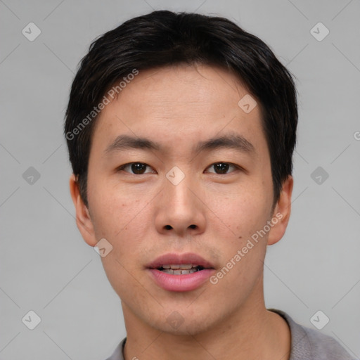 Neutral asian young-adult male with short  brown hair and brown eyes