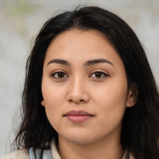 Neutral latino young-adult female with medium  black hair and brown eyes