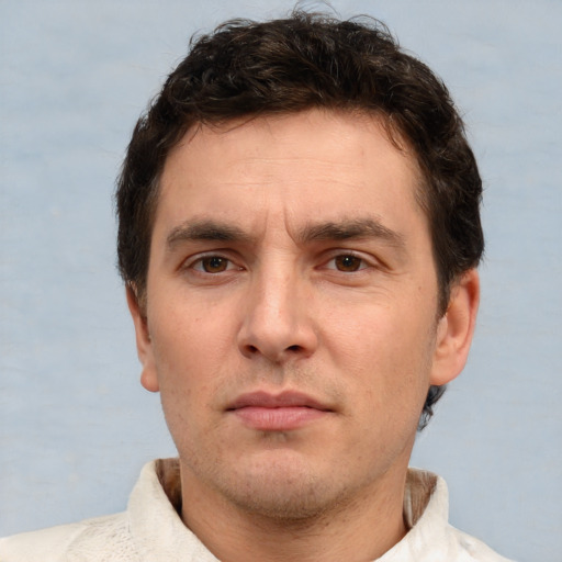 Neutral white adult male with short  brown hair and brown eyes