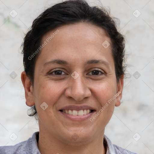 Joyful white adult female with short  brown hair and brown eyes