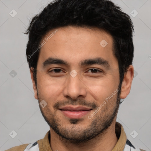 Joyful white young-adult male with short  black hair and brown eyes