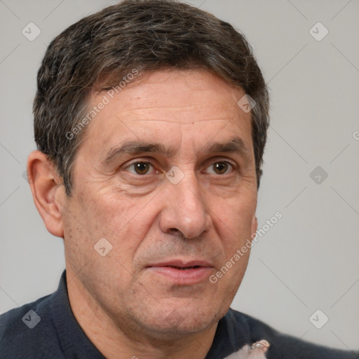 Joyful white middle-aged male with short  brown hair and brown eyes