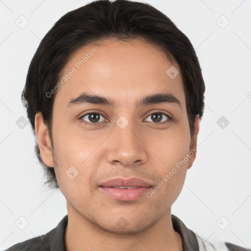 Joyful latino young-adult male with short  brown hair and brown eyes