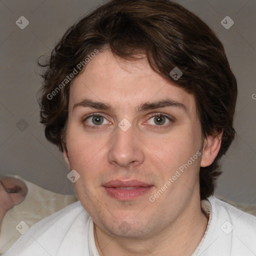 Joyful white young-adult male with medium  brown hair and brown eyes