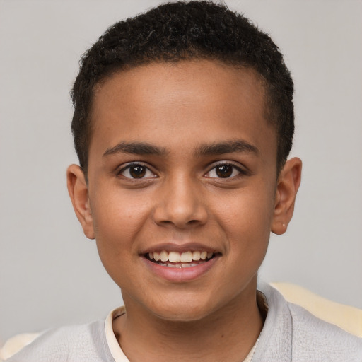 Joyful white child male with short  brown hair and brown eyes