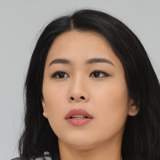 Neutral asian young-adult female with long  black hair and brown eyes