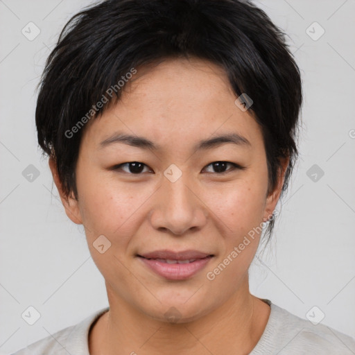 Joyful asian young-adult female with short  brown hair and brown eyes