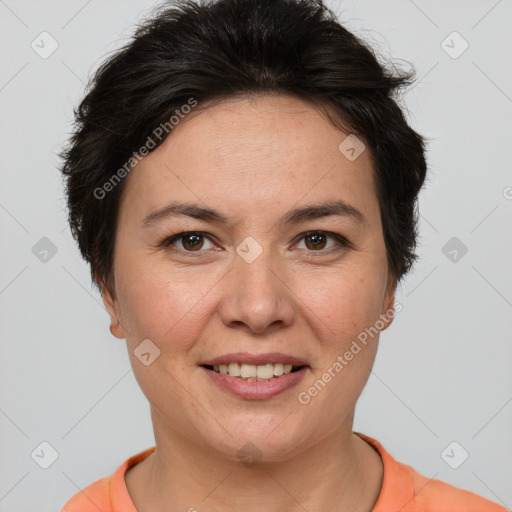 Joyful white adult female with short  brown hair and brown eyes