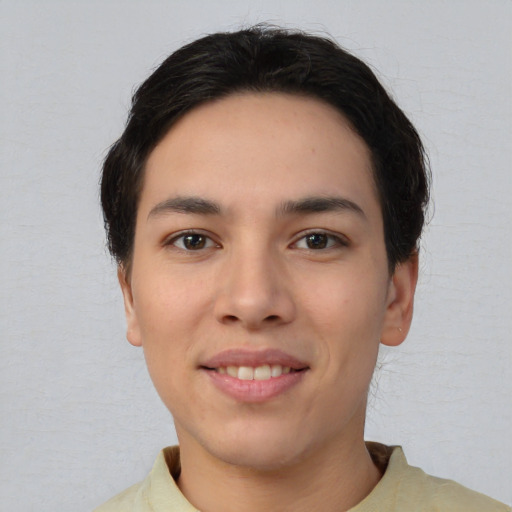 Joyful white young-adult female with short  black hair and brown eyes