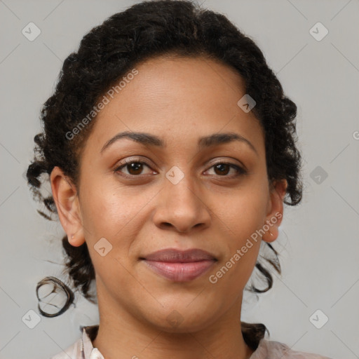 Joyful latino adult female with medium  brown hair and brown eyes