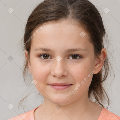 Joyful white child female with medium  brown hair and brown eyes