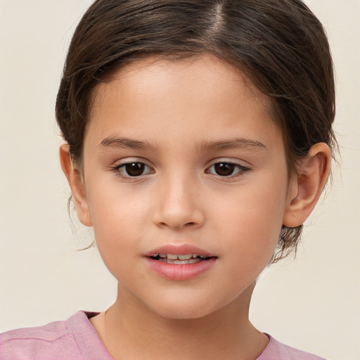 Joyful white child female with medium  brown hair and brown eyes