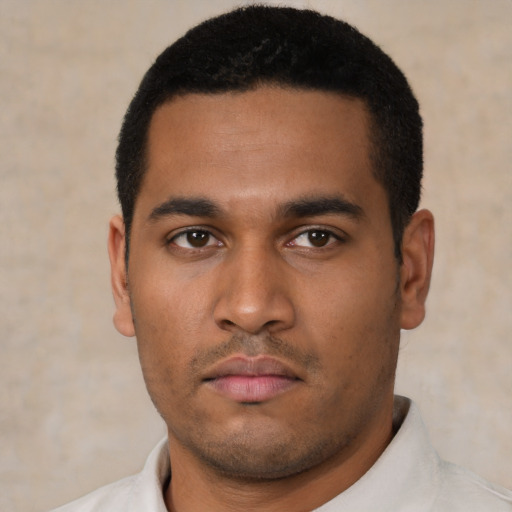 Neutral latino young-adult male with short  black hair and brown eyes