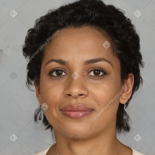 Joyful black young-adult female with medium  brown hair and brown eyes