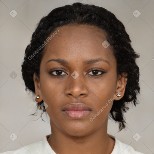 Neutral black young-adult female with medium  black hair and brown eyes