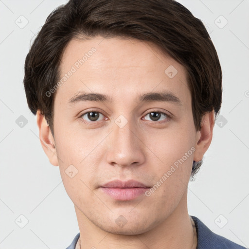 Neutral white young-adult male with short  brown hair and brown eyes