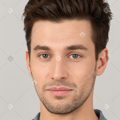 Neutral white young-adult male with short  brown hair and brown eyes