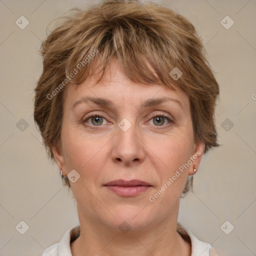 Joyful white adult female with medium  brown hair and grey eyes