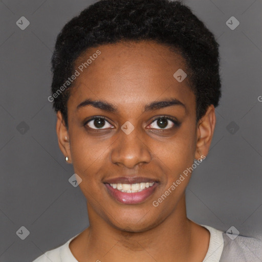 Joyful black young-adult female with short  black hair and brown eyes