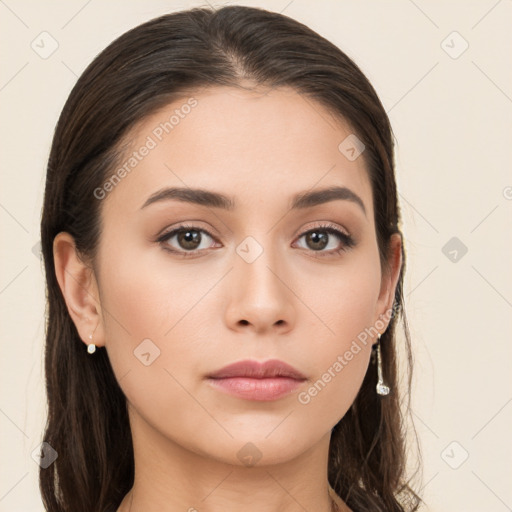 Neutral white young-adult female with long  brown hair and brown eyes