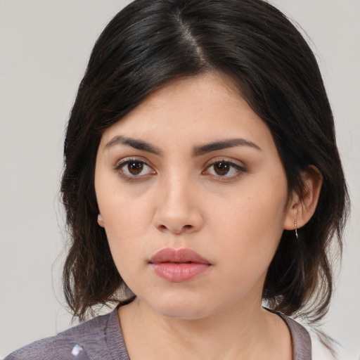 Neutral white young-adult female with medium  black hair and brown eyes