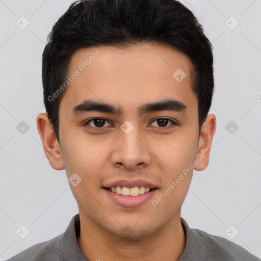 Joyful latino young-adult male with short  brown hair and brown eyes