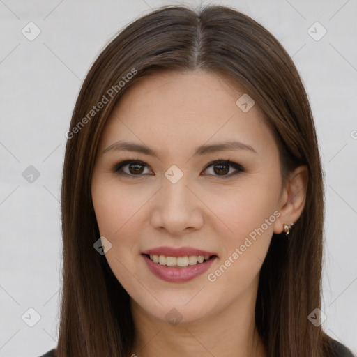 Joyful white young-adult female with long  brown hair and brown eyes