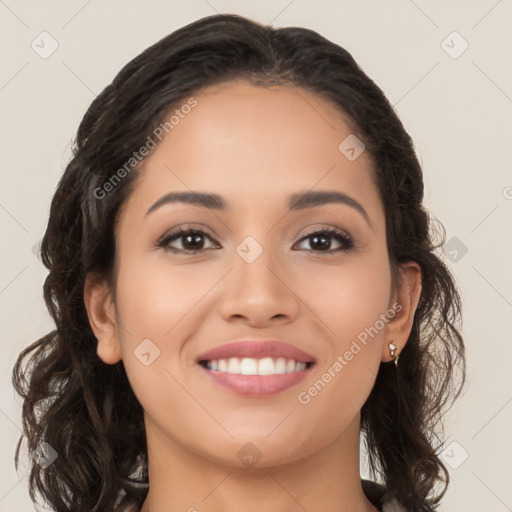 Joyful latino young-adult female with long  brown hair and brown eyes