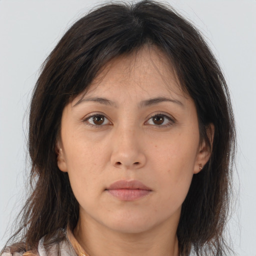 Neutral asian young-adult female with medium  brown hair and brown eyes