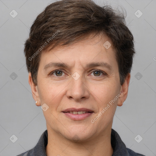 Joyful white adult male with short  brown hair and grey eyes