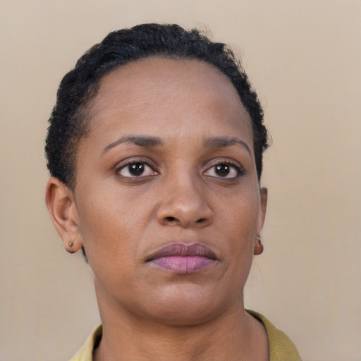 Neutral black young-adult female with short  brown hair and brown eyes