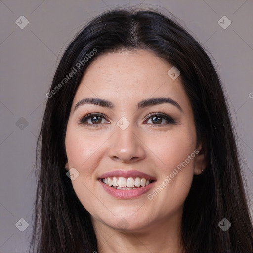 Joyful white young-adult female with long  black hair and brown eyes