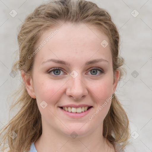 Joyful white young-adult female with medium  brown hair and blue eyes