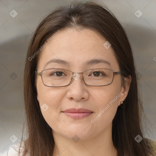 Joyful white adult female with long  brown hair and brown eyes