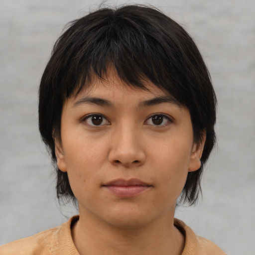 Neutral asian young-adult female with medium  brown hair and brown eyes