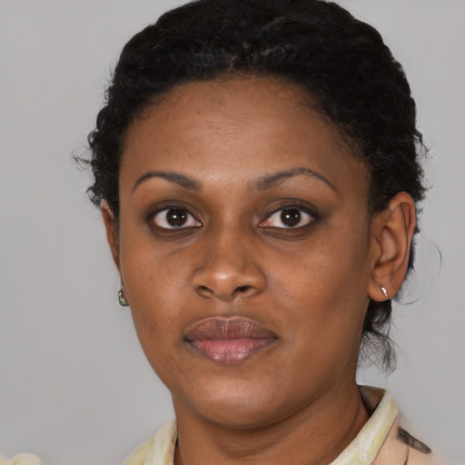 Neutral black young-adult female with short  black hair and brown eyes