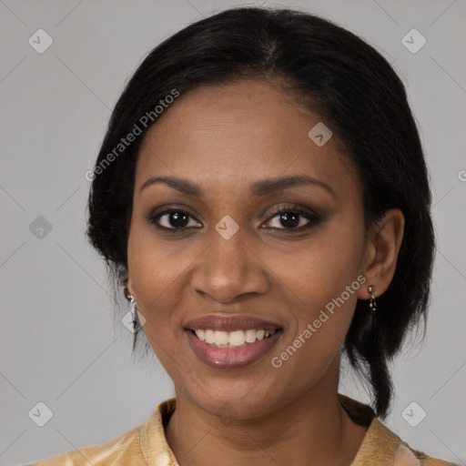 Joyful black young-adult female with medium  black hair and brown eyes