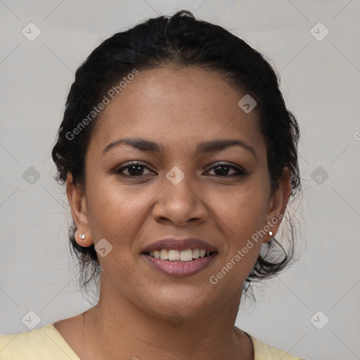 Joyful latino young-adult female with short  black hair and brown eyes