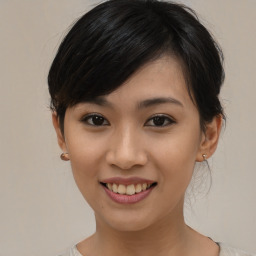 Joyful asian young-adult female with medium  black hair and brown eyes