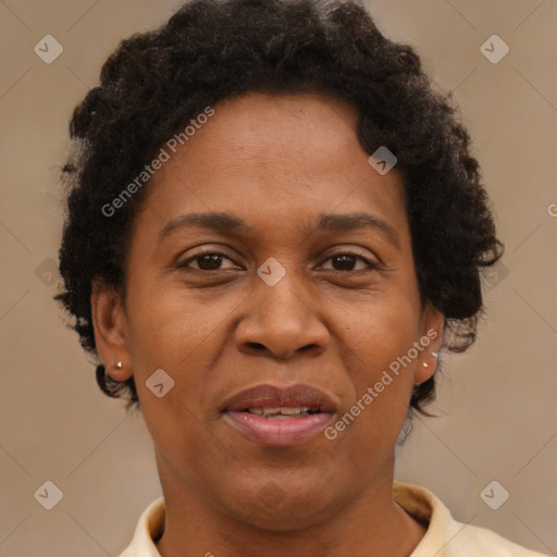 Joyful black adult female with short  brown hair and brown eyes