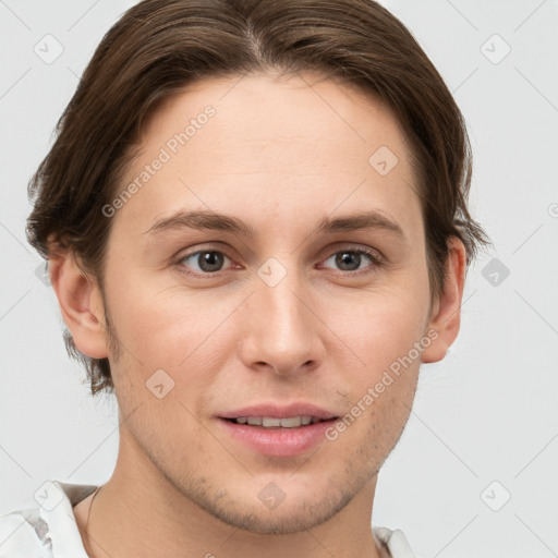 Joyful white young-adult female with short  brown hair and grey eyes